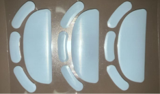 Des patins à souris en polytétrafluoroéthylène gris PTFE